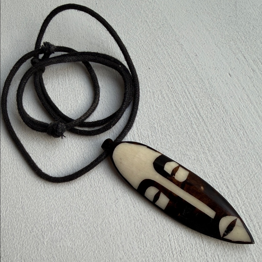 African Bone Face Mask Pendant Necklace on adjustable cord - Picture 2 of 8